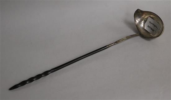 A George III silver toddy ladle, with baleen handle, 37.3cm.